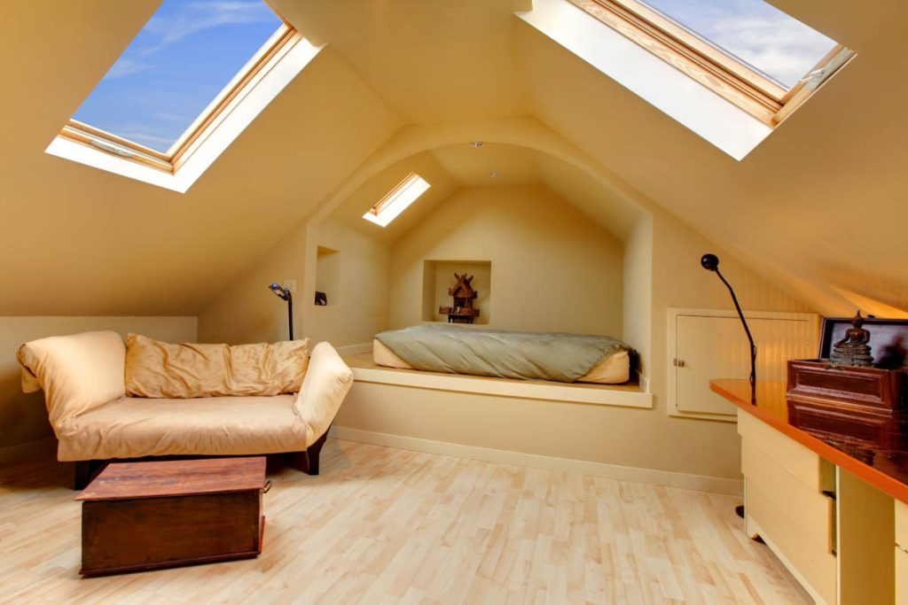 Adorable Attic Bedroom With Unique Design and two skylights